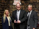 Debbie Batson, Mike Feltman, and Dr. Kurt A. Polzin, Moquin (POY) Award Winner